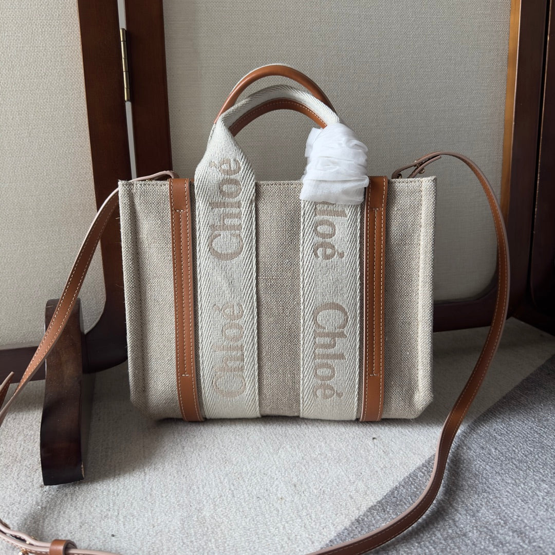 SMALL WOODY TOTE BAG 26.5 IN BEIGE LINEN CANVAS WEBBING LOGO EMBROIDERY BROWN CALFSKIN - Main Image