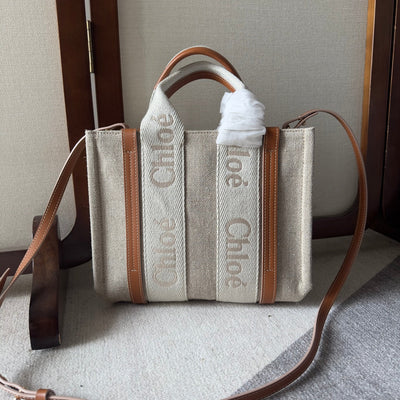 SMALL WOODY TOTE BAG 26.5 IN BEIGE LINEN CANVAS WEBBING LOGO EMBROIDERY BROWN CALFSKIN - Main Image