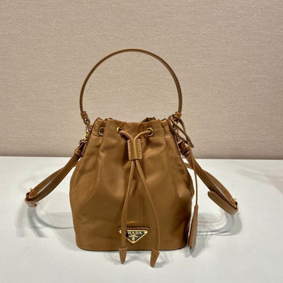 bucket bag 19 in russet brown re-nylon and calfskin handle - main image