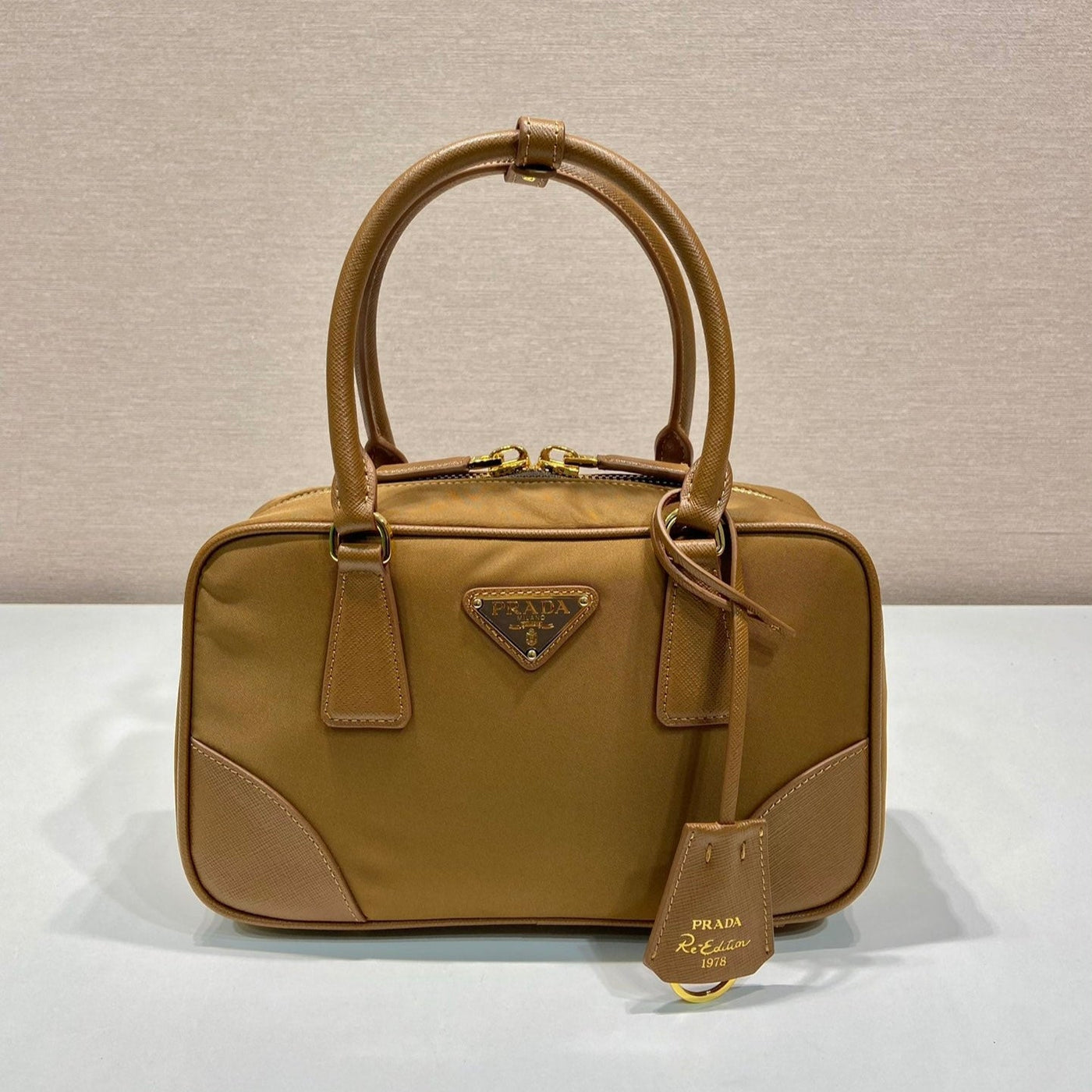 small top handle bag 25 in golden brown nylon and calfskin trim - main image