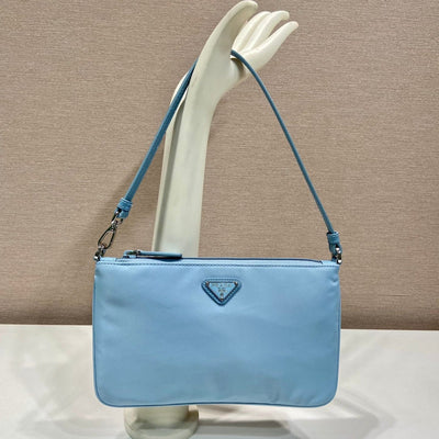 shoulder bag 24 with triangle logo in sky blue re-nylon fabric - main image