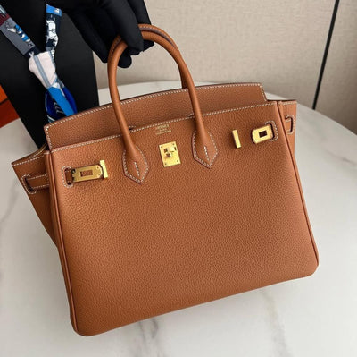 Herm*s birkin 25 gold colour with gold hardware - image 3