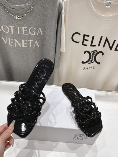 loewe leather petal anagram slides in black - image 3