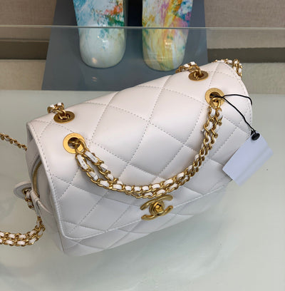 Chan*l mini backpack replica 11 milk white with gold lock 18x20x11.5cm - image 3