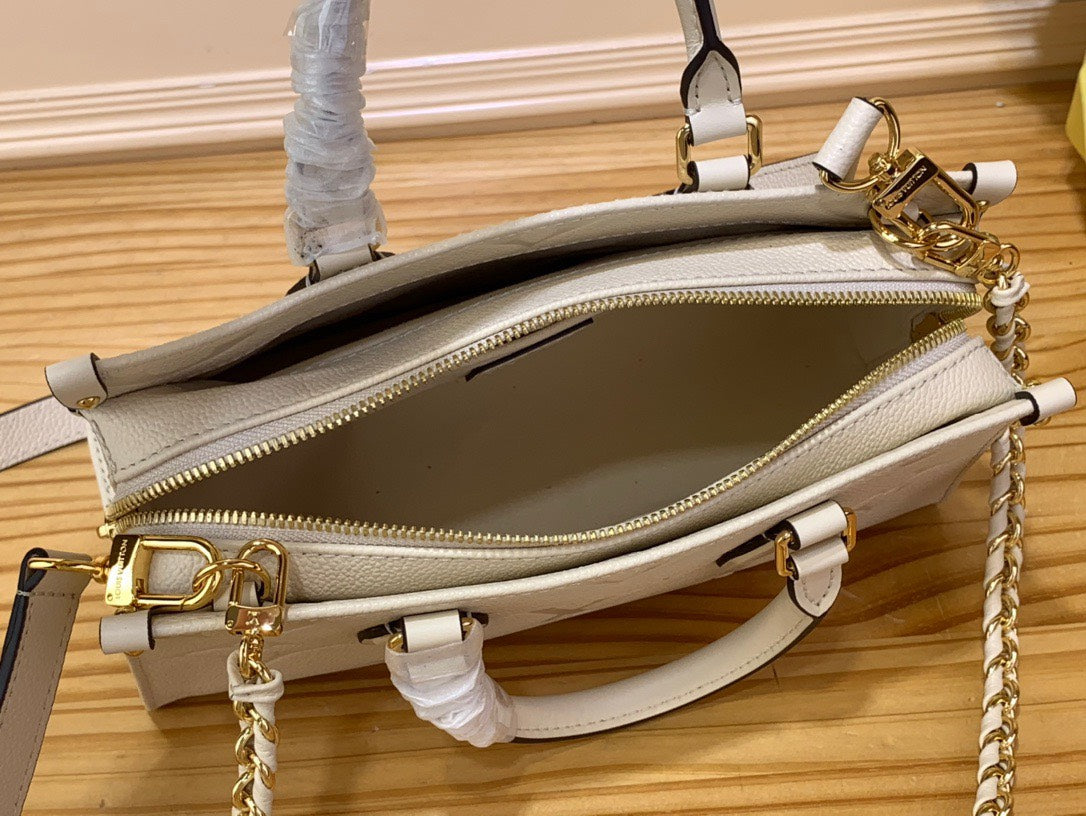 Lou*s Vuitt*n lv on the go mini replica 11 white milk handbags 25x13x10cm - image 2