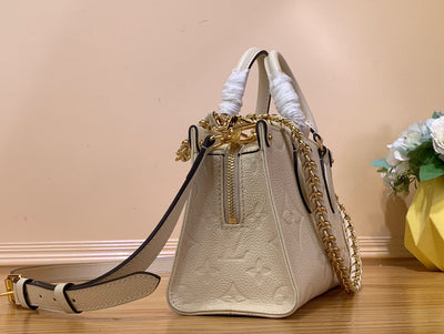 Lou*s Vuitt*n lv on the go mini replica 11 white milk handbags 25x13x10cm - image 7