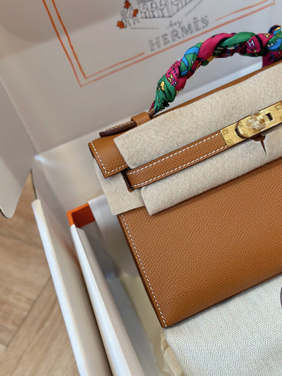 Herm*s pochette woman’s brown lock gold handbags 34x15x6cm - image 2