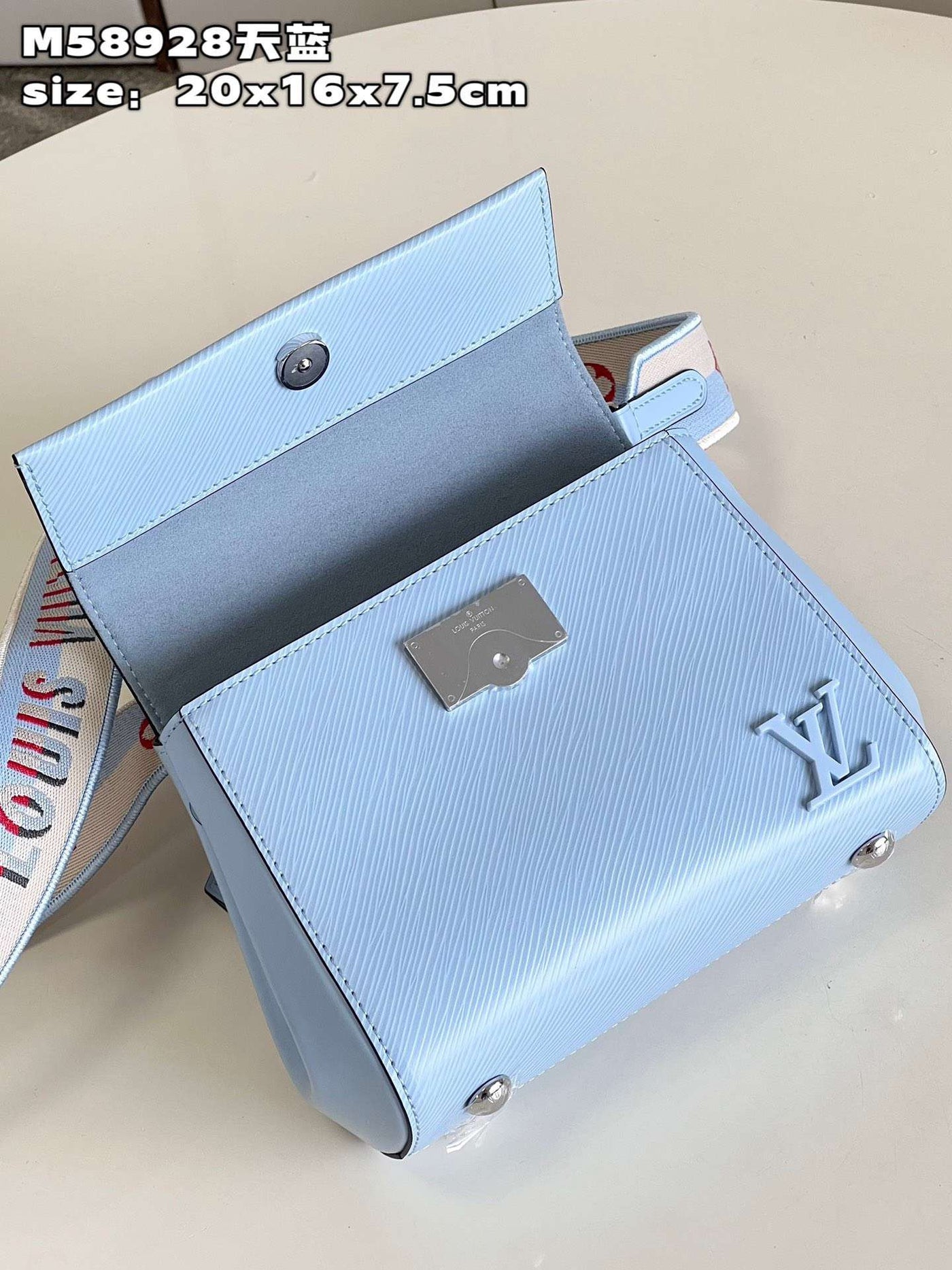 Lou*s Vuitt*n clunny blue raised pattern handbags 20x16cm - image 8