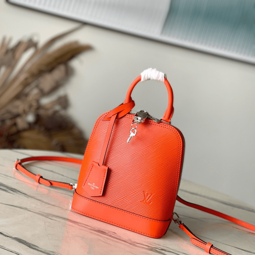 Lou*s Vuitt*n lv alma like auth backpack orange lock silver 15x20x10cm - main image