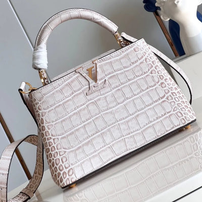 Lou*s Vuitt*n lv capucines crocodile leather handbag with gold buckle 31cm - main image