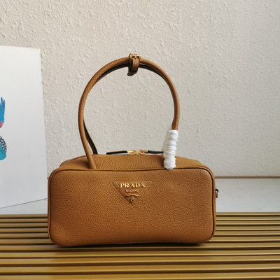 Pr*da medium leather top-handle bag in brown - main image