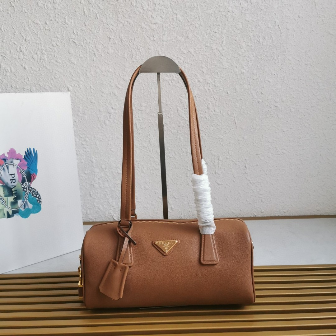 Pr*da caramel medium leather top-handle bag with padlock - main image