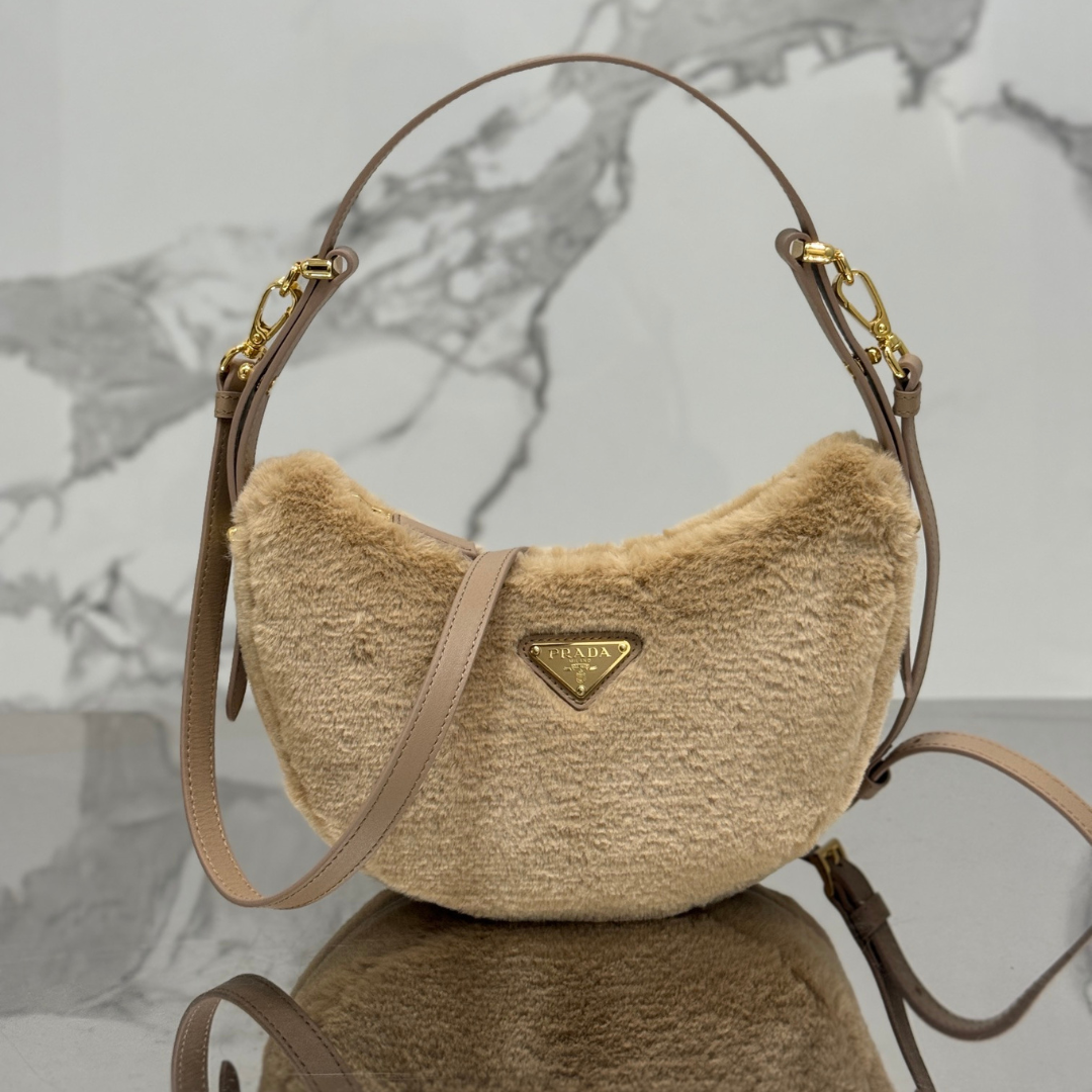 Pr*da leather and shearling arquã¨ handbag - main image