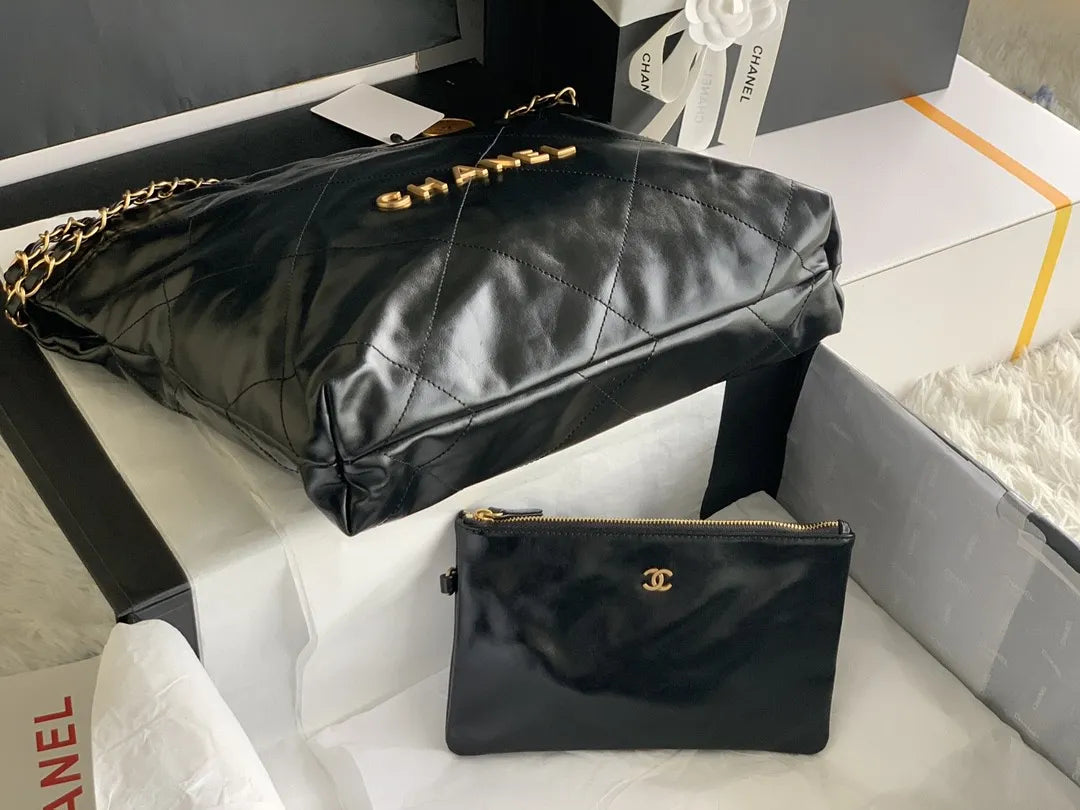 Chan*l 22 small handbag in black - image 4