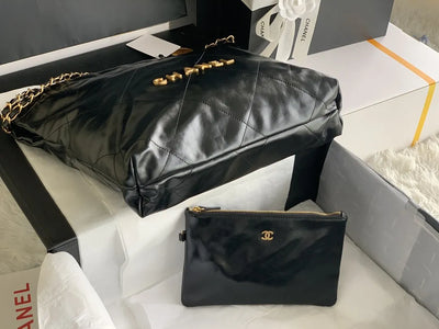 Chan*l 22 small handbag in black - image 4