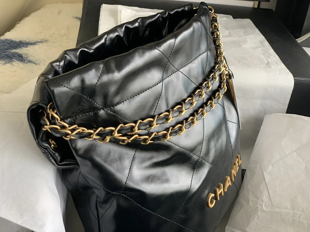Chan*l 22 small handbag in black - image 5