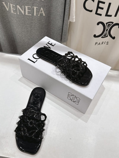 loewe leather petal anagram slides in black - image 6