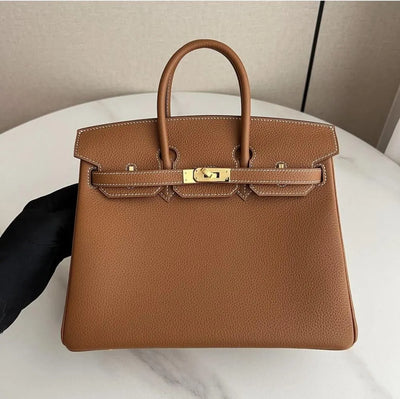 Herm*s birkin 25 gold colour with gold hardware - main image