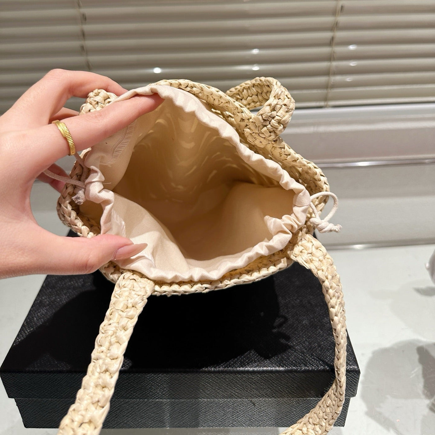 CROCHET BUCKET BAG 18 IN BEIGE WOVEN RAFFIA EMBROIDED LOGO