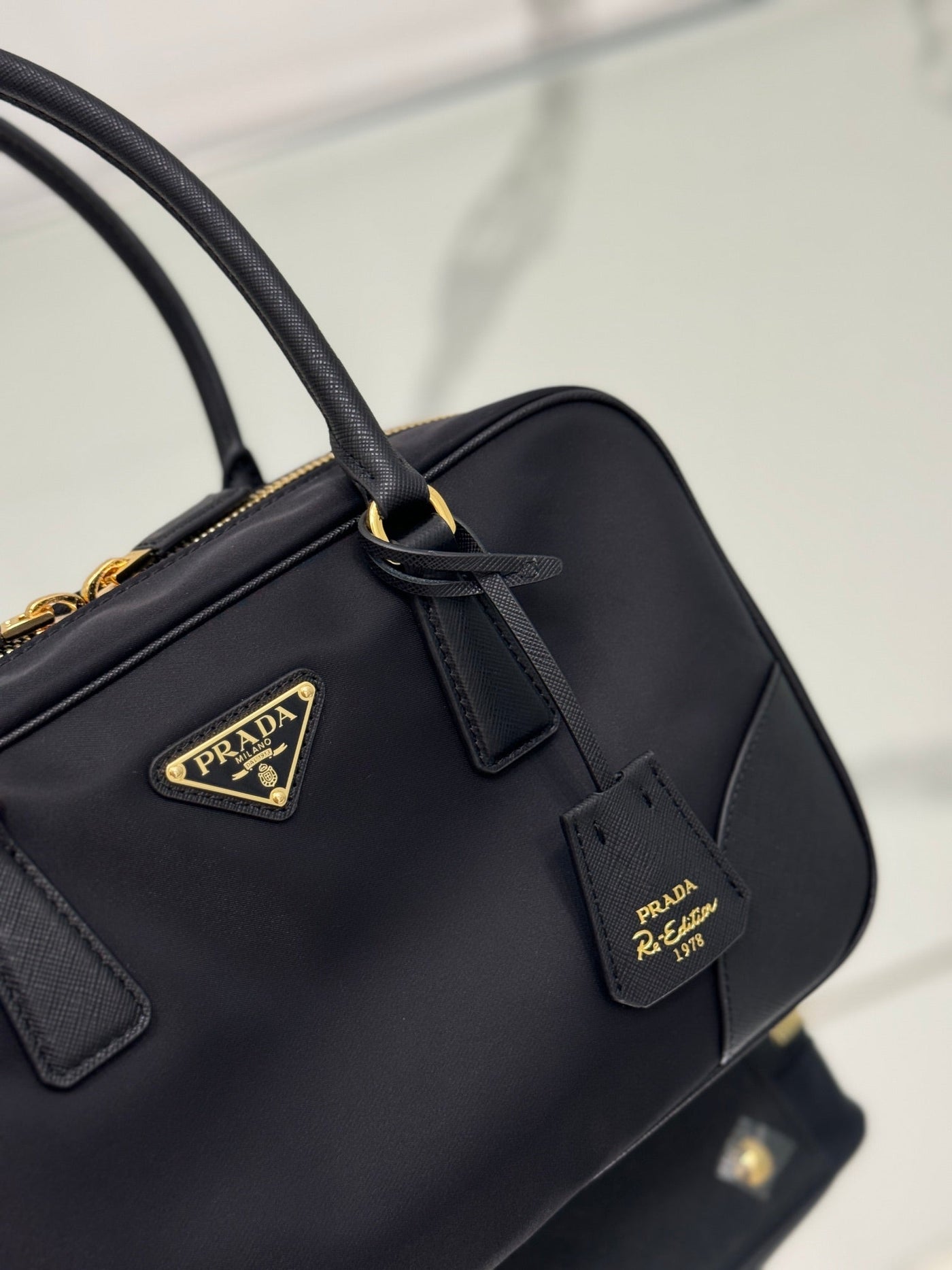 medium top handle bag 30 in black nylon and calfskin trim - image 3