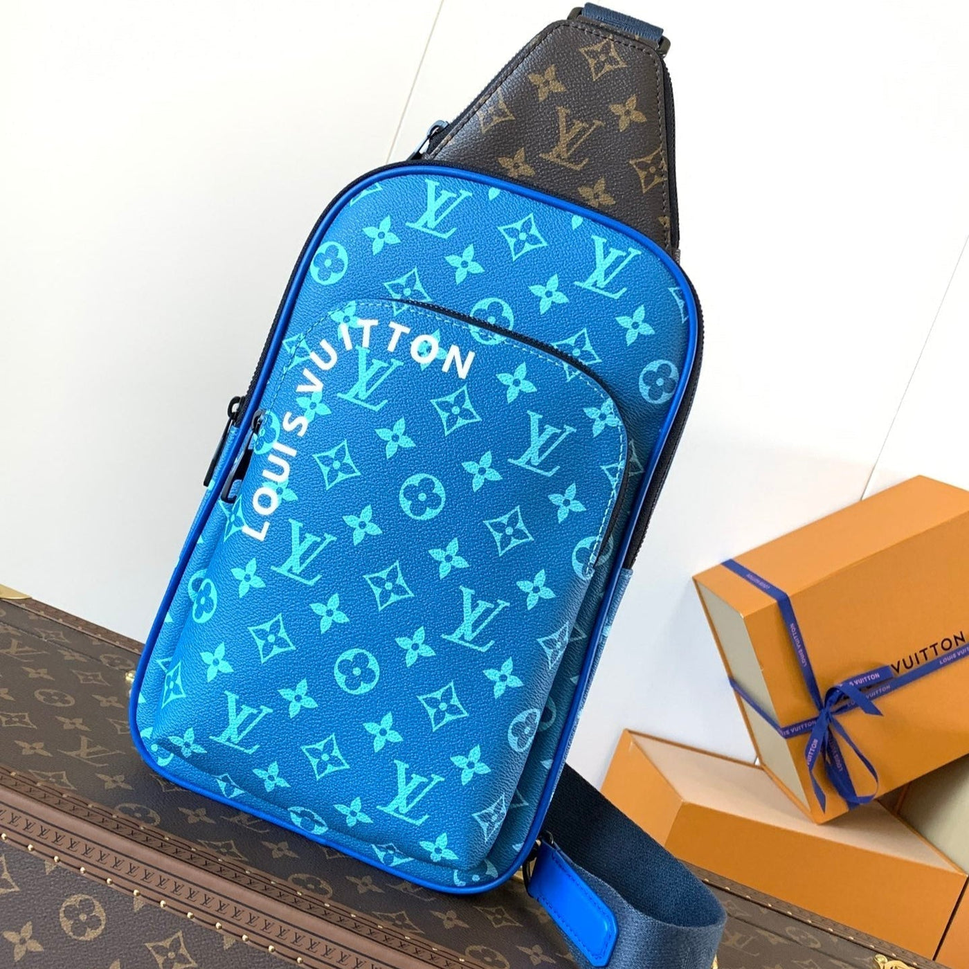 lv avenue slingbag 31 in blue and brown taiga leather - main image