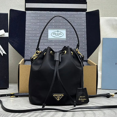 bucket bag 19 in black re-nylon and calfskin handle - main image