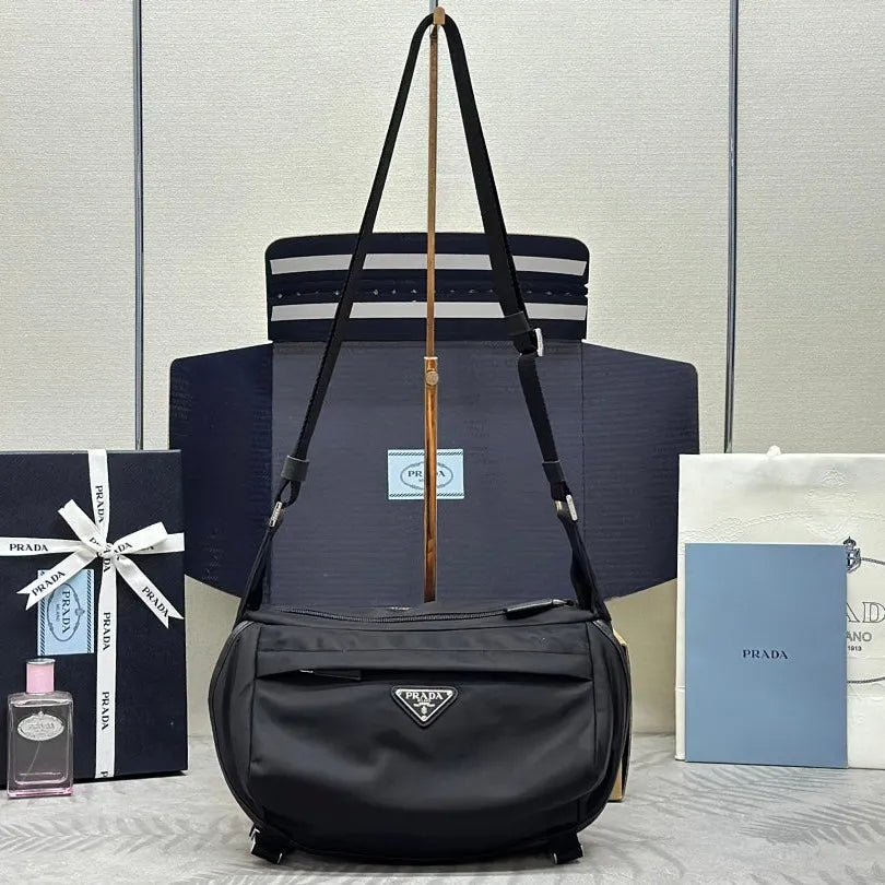 shoulder bag 32 in black re-nylon triangle logo - main image